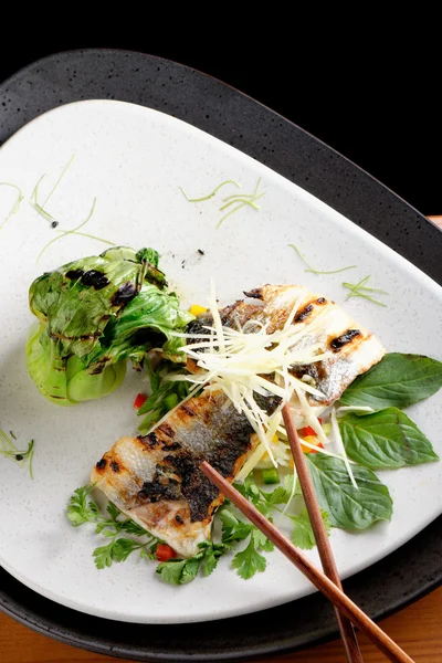 Grilled sea bass fillet with ginger, fresh peppers — Stock Photo, Image