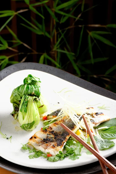 Grilled sea bass fillet with ginger, fresh peppers — Stock Photo, Image