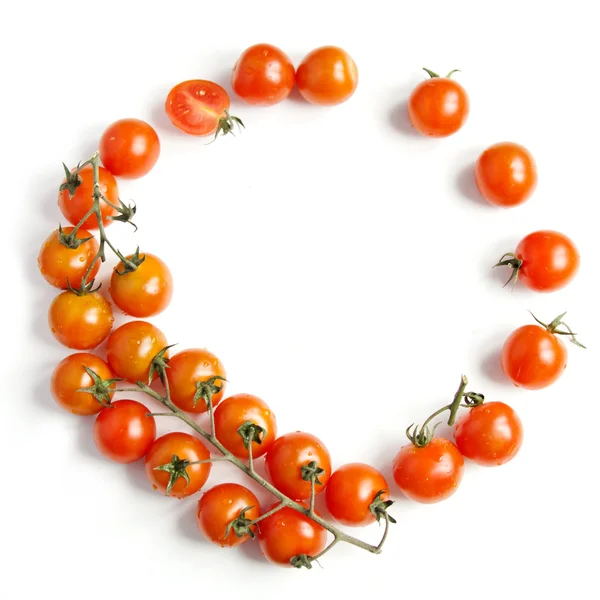 Marco de tomates cherry sobre fondo blanco —  Fotos de Stock