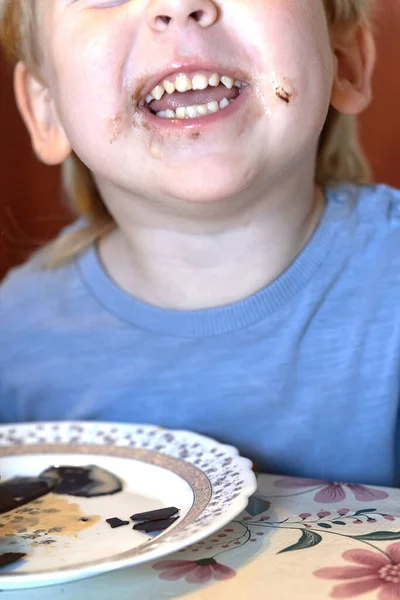 Child mouth stained with chocolate and a fragment of the face — Stock Photo, Image