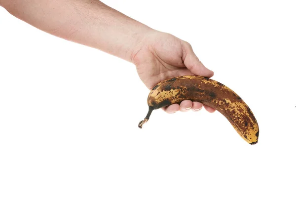 Hand hält eine reife Banane auf weißem Hintergrund, Vorlage für Designer — Stockfoto