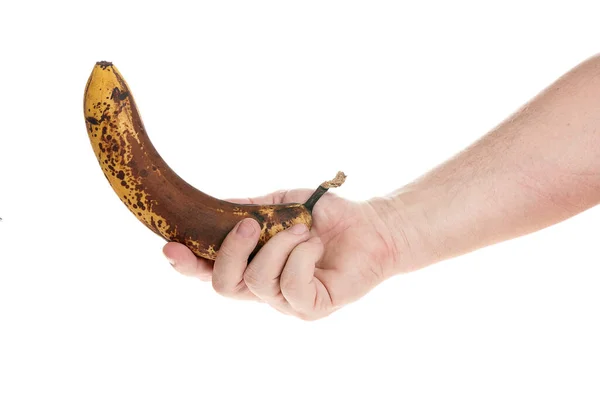 Ręka trzyma dojrzałego banana na białym tle, szablon dla projektantów — Zdjęcie stockowe