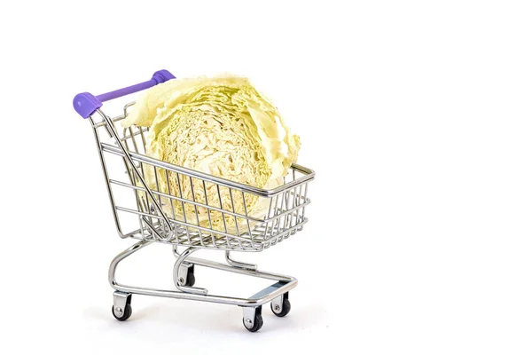 Kool in een supermarkt trolley op een witte achtergrond — Stockfoto