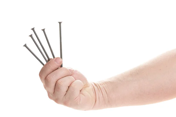 Hand holds metal screws on a white background, a template for designers. — Stock Photo, Image