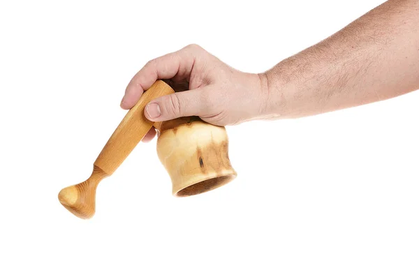 Hand holds a wooden mortar on a white background — Stock Photo, Image
