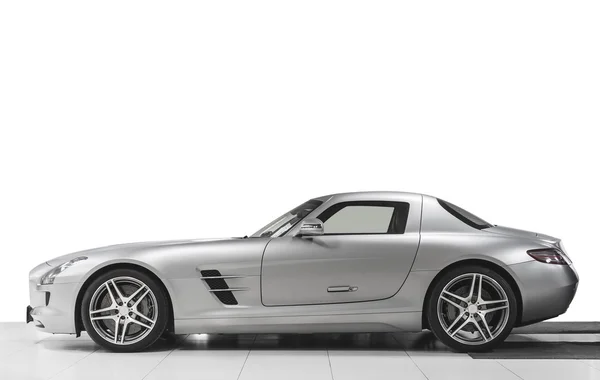 Modern sport sport car exterior - side view. Isolated on white background