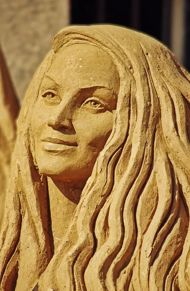 International Sand Sculpture Festival in Saint - Petersburg, August 3, 2014.Fragment the sculpture - female figure. — Stock Photo, Image