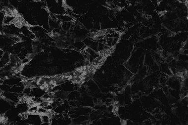 Yüksek çözünürlüklü siyah gri mermer desenli arka plan, pürüzsüz parıltı desenli ve konforlu doğal taşların karşı görünüşü.