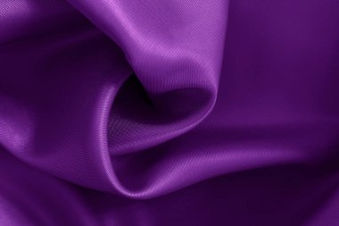 Arka plan ve tasarım için mor kumaş dokusu, güzel buruşmuş ipek ya da keten deseni..