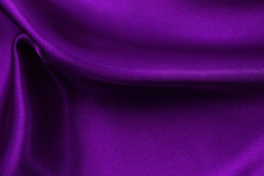 Arka plan ve tasarım için mor kumaş dokusu, güzel buruşmuş ipek ya da keten deseni..