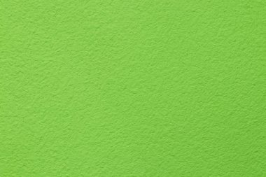 Arkaplan ve tasarım sanatı için açık yeşil beton duvar dokusu.