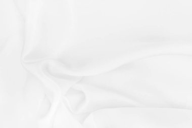 Arkaplan ve tasarım için beyaz kumaş kumaş dokusu, güzel buruşmuş ipek ya da keten deseni.