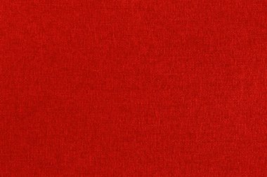 Koyu kırmızı kumaş dokusu arka plan, doğal tekstil yüzeyinin pürüzsüz deseni.
