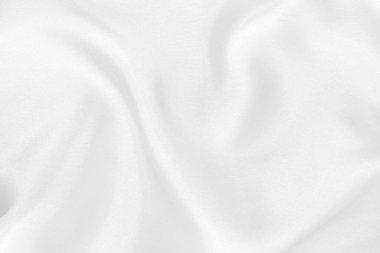 Arkaplan ve tasarım için beyaz kumaş kumaş dokusu, güzel buruşmuş ipek ya da keten deseni.