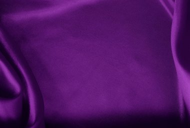 Arka plan ve tasarım için mor kumaş dokusu, güzel buruşmuş ipek ya da keten deseni..