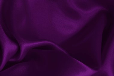 Arka plan ve tasarım için mor kumaş dokusu, güzel buruşmuş ipek ya da keten deseni..