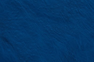 Koyu mavi deri desenli ve yüksek çözünürlüklü arka plan.