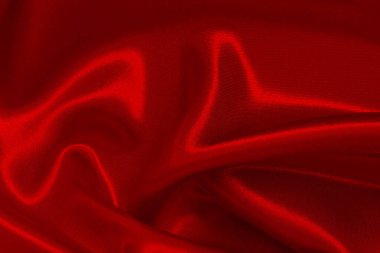 Arka plan ve tasarım için koyu kırmızı kumaş dokusu, güzel buruşmuş ipek ya da keten deseni..