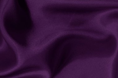 Arka plan ve tasarım için mor kumaş dokusu, güzel buruşmuş ipek ya da keten deseni..