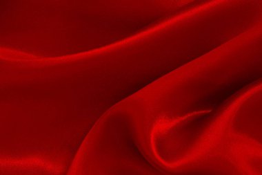 Arka plan ve tasarım için koyu kırmızı kumaş dokusu, güzel buruşmuş ipek ya da keten deseni..