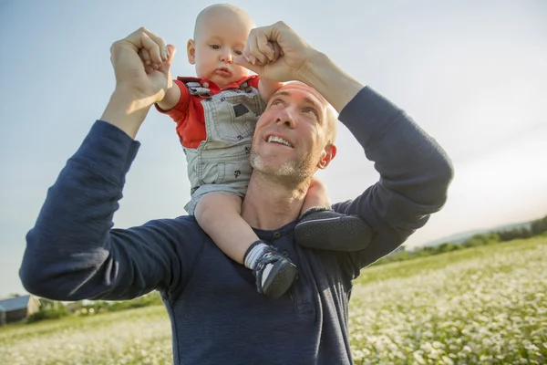 Happy joyful father with baby — Stock Photo, Image