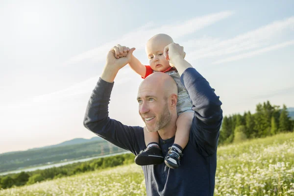 Happy joyful father with baby — Stock Photo, Image