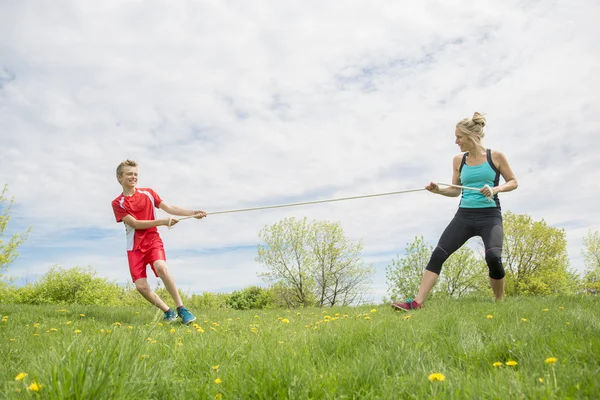 Mother and Son Tug of War — Stock Photo, Image