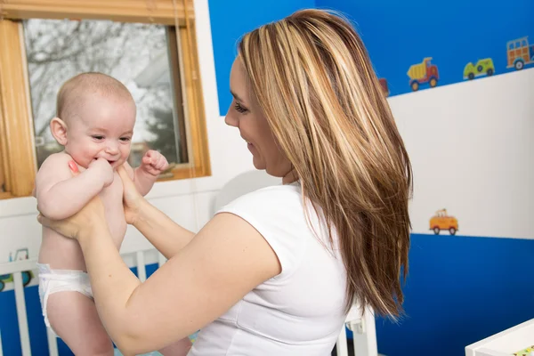 Picture of happy mother with adorable baby — Stock Photo, Image