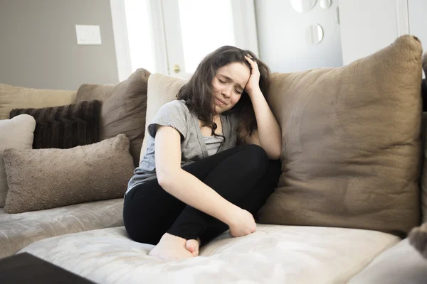 Expression of lonely female teenager at home — Stock Photo, Image