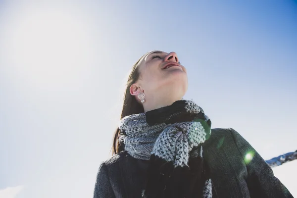 Portrait of happy young woman have fun at beautiful sunny winter day — Stock Photo, Image