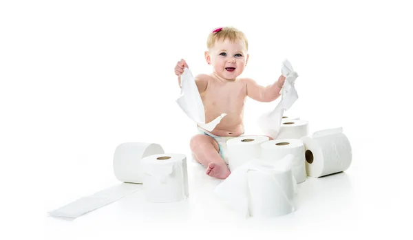 Toddler ripping up toilet paper in bathroom studio — Stock Photo, Image