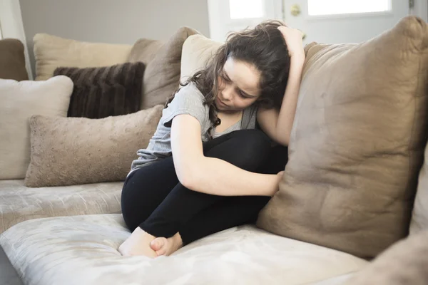 Expression of lonely female teenager at home — Stock Photo, Image