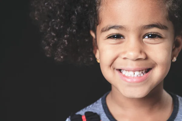 Portrait of a cute african american little boy, isolated on blac — Stock Photo, Image
