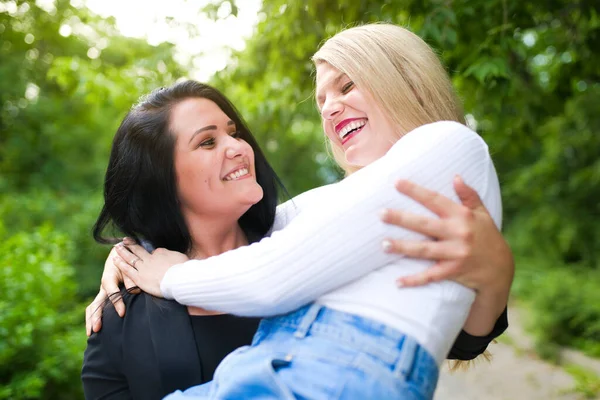 Two happy beautiful girls having fun outdoor — Stock Photo, Image