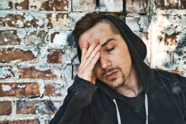 Sad urban man with hood on head. Mystery man — Stock Photo, Image