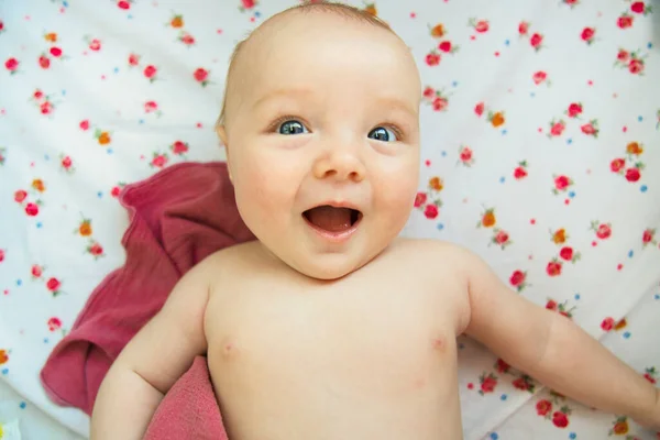 Cute two month old baby in bed at home — Stock Photo, Image