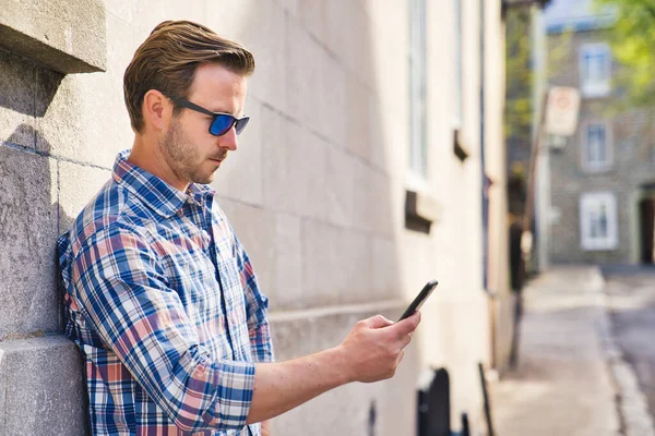 Portrait of a trendy young man in the city — Stock Photo, Image