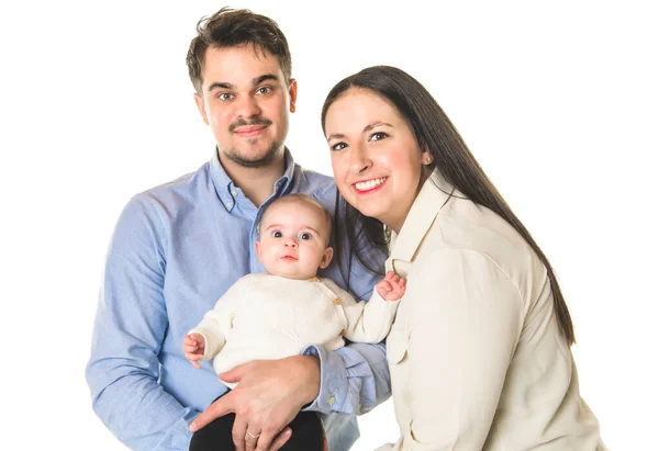 En trevlig familj med liten flicka över vit — Stockfoto