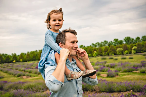 Happy family father and daughter having fun in lavender field — Stock Photo, Image