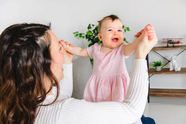 Young family mother at home with the baby child girl — Stock Photo, Image