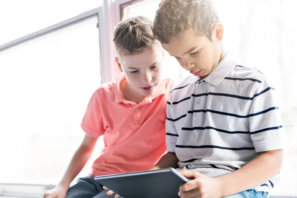 Boys or students with tablet pc computer school lesson — Stock Photo, Image