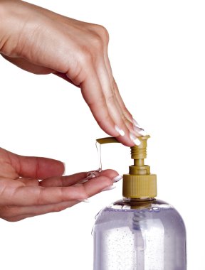 A hand soap with pumping lotion from bottle clipart