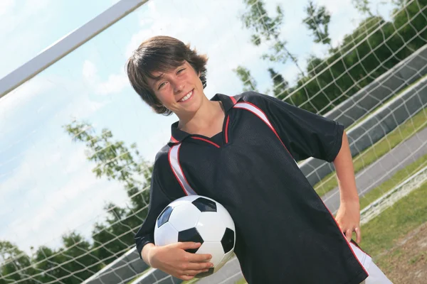 Miúdo do futebol — Fotografia de Stock