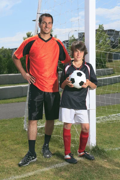 Miúdo do futebol — Fotografia de Stock