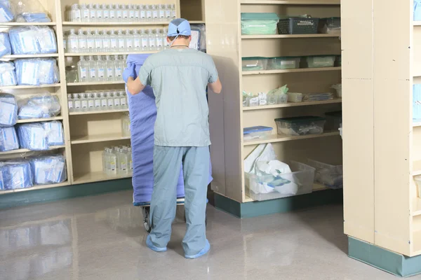 Medical staff sterilizing hands and arms before surgery — Stock Photo, Image