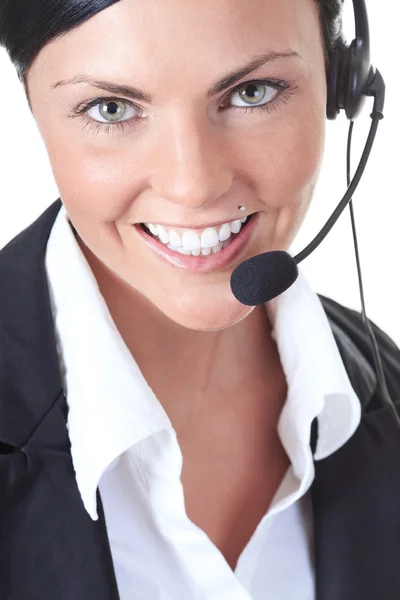 Jeune opérateur d'appel agréable femme sur un fond blanc — Photo