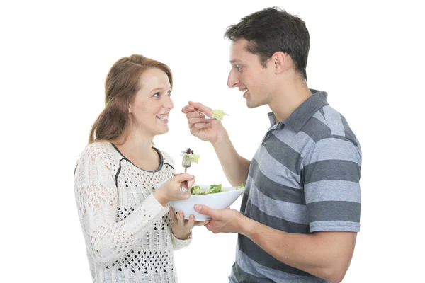 Happy mature couple having fun while cooking, Studio Shot — Stock Photo, Image