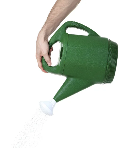 Hand pouring water from watering can — Stock Photo, Image