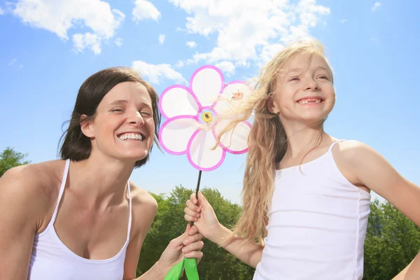 A Mother and Daughter play with the wind — Stock Photo, Image