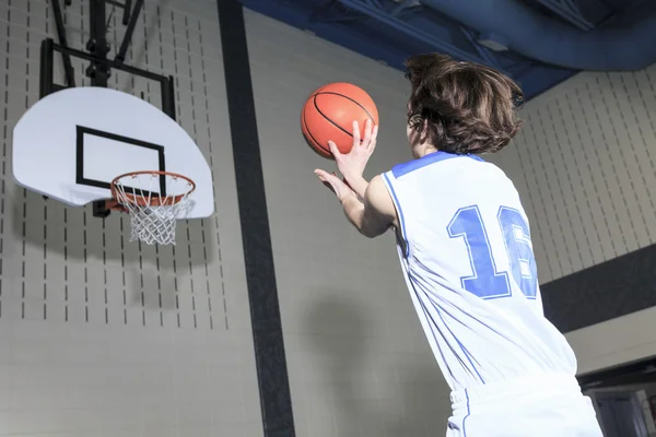 A teenager basketball player play his favorite sport — Stock Photo, Image